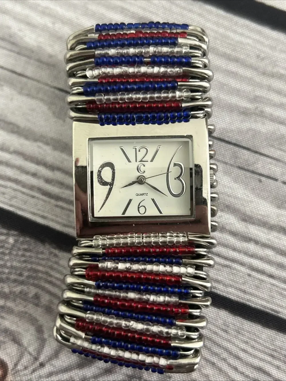 Charming Charlie Silver Tone Red White And Blue Band Women’s Quartz Watch